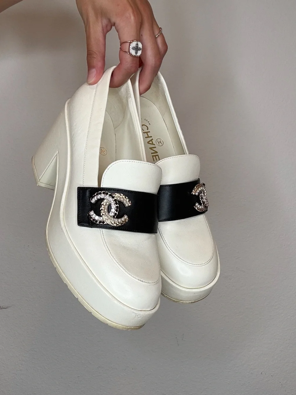 CHANEL White Leather Loafers with Black Band and Crystal CC Emblem